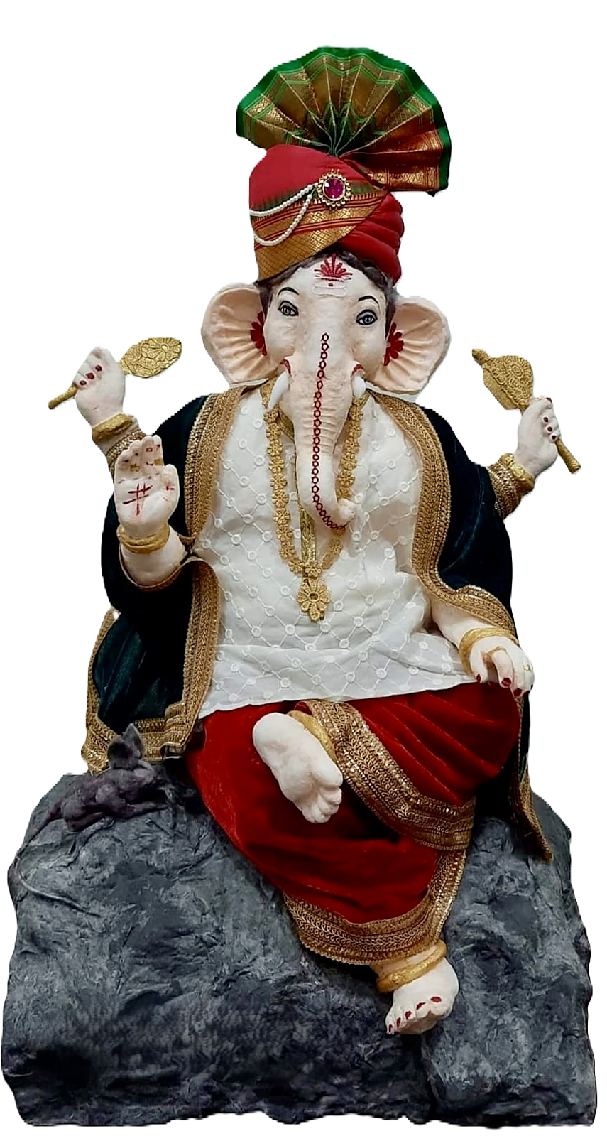 Cotton sculpture of Ganesha seated on a rock in colourful attire